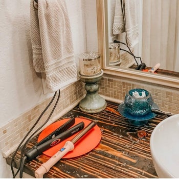 the mat being used underneath hot styling tools