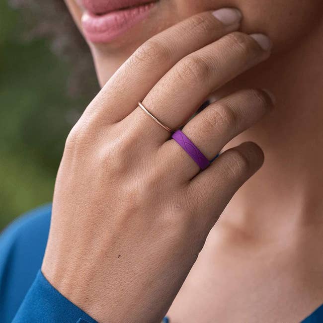 model wearing the ring in purple