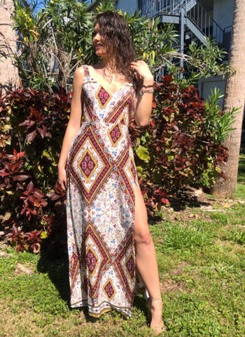 reviewer wearing the maxi dress with slit 