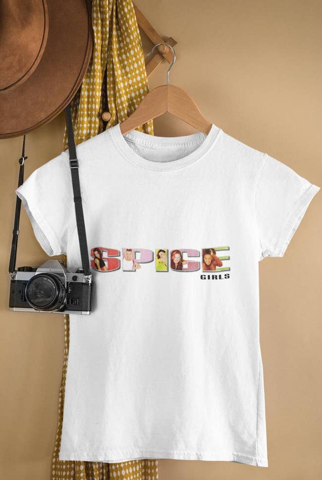 white t-shirt with the spice girls logo on the front 