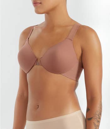 a close up of a model in brown