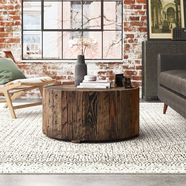Image of the brown wood coffee table in a living room