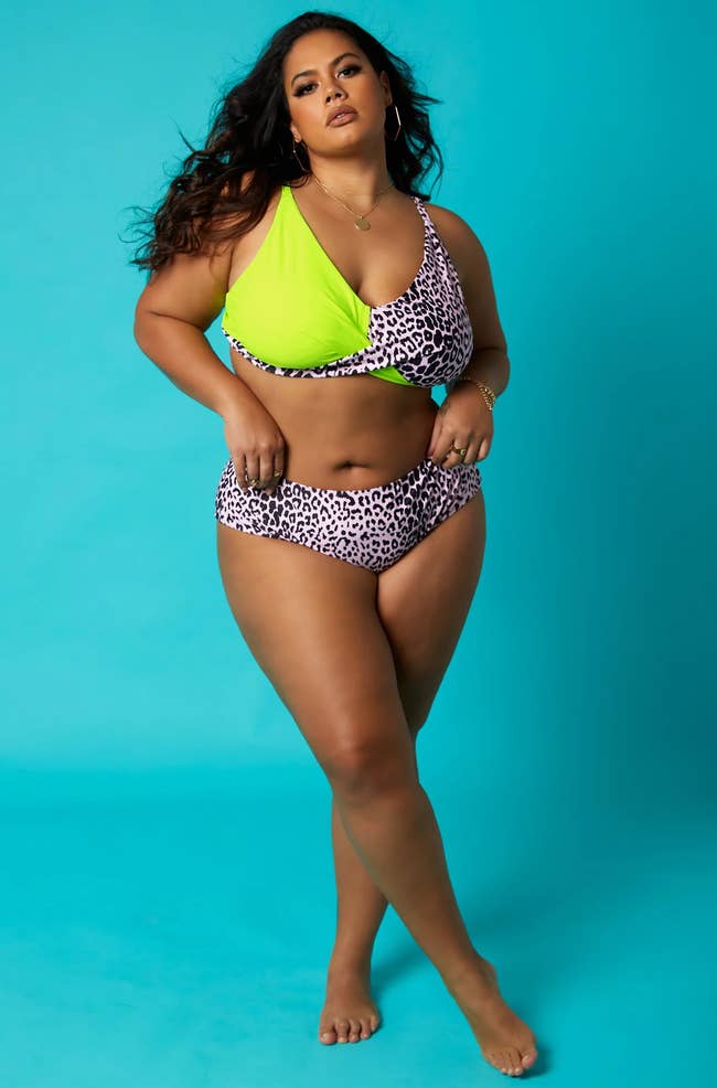 model posing in lime green and cheetah print bikini