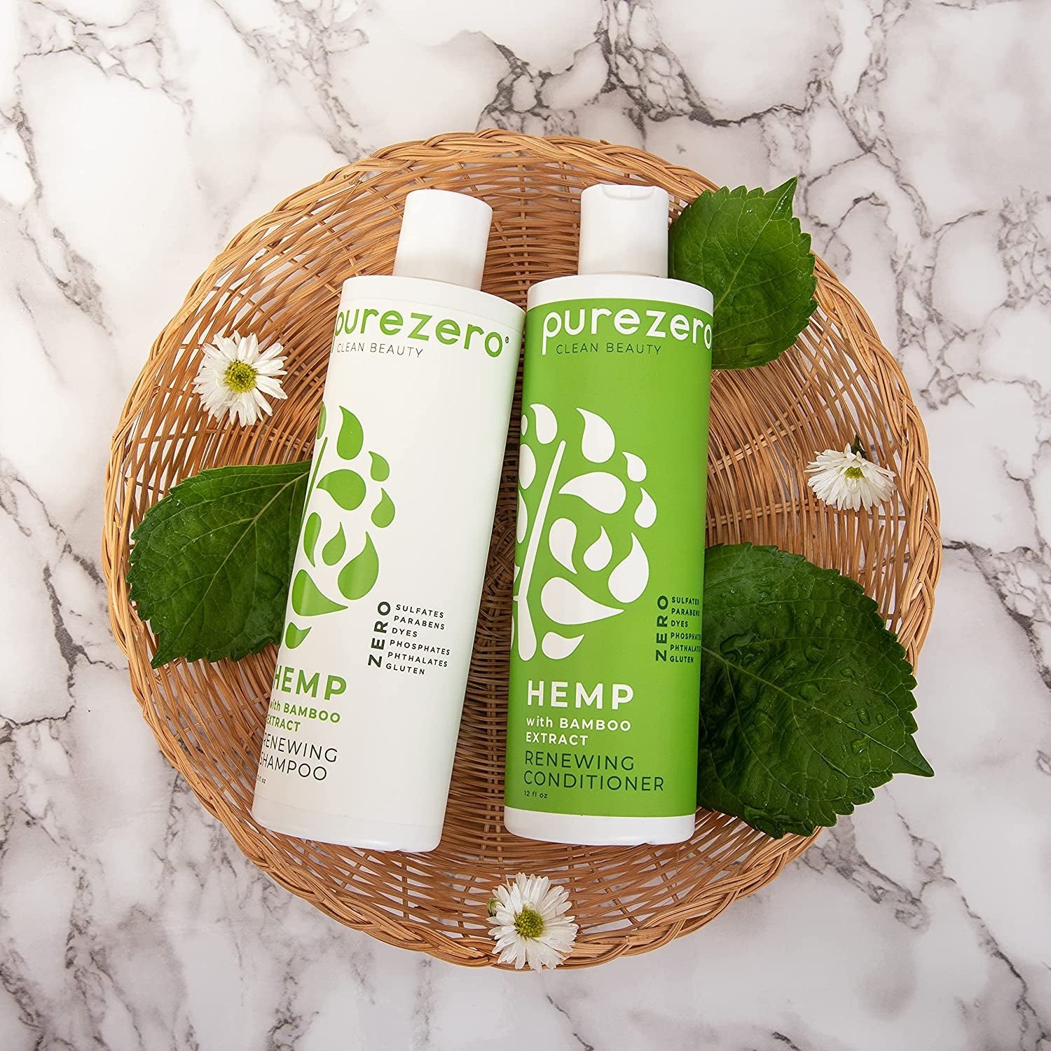 White and green shampoo and conditioner bottles in a brown woven basket on marble table