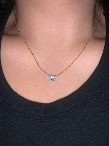 reviewer photo of their gold chain and cubic zirconia pendant necklace