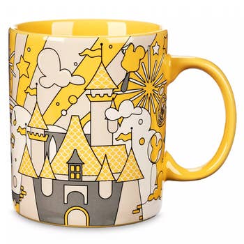 a yellow mug with disney parks icons on it