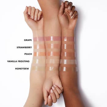 three arms showing swatches of different lip balm shades with corresponding flavor names