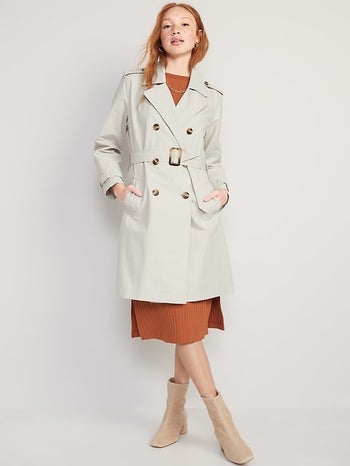 model wearing the beige trench coat