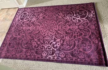 Reviewer image of plum-colored rug