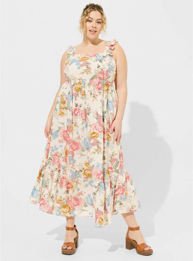 Model wearing a floral print maxi dress