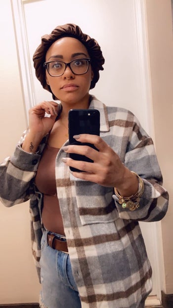 reviewer mirror selfie wearing gray plaid shacket