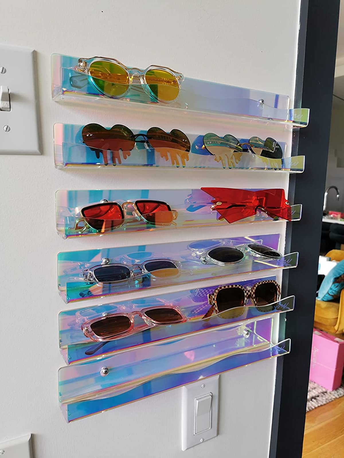 a review uses the six shelves for holding sunglasses