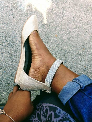 Close-up of a aforesaid  reviewer's footwear  displaying debased  wedge