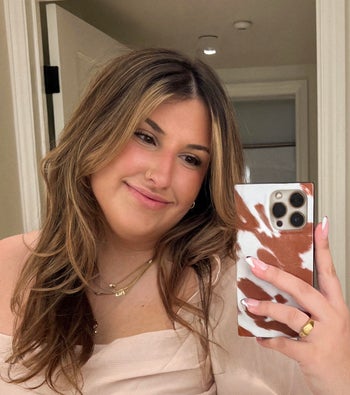 BuzzFeed writer Ali Faccenda takes selfie after applying the tinted foundation