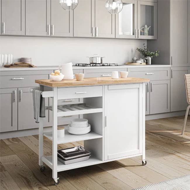 the rolling white kitchen cart with solid wood top