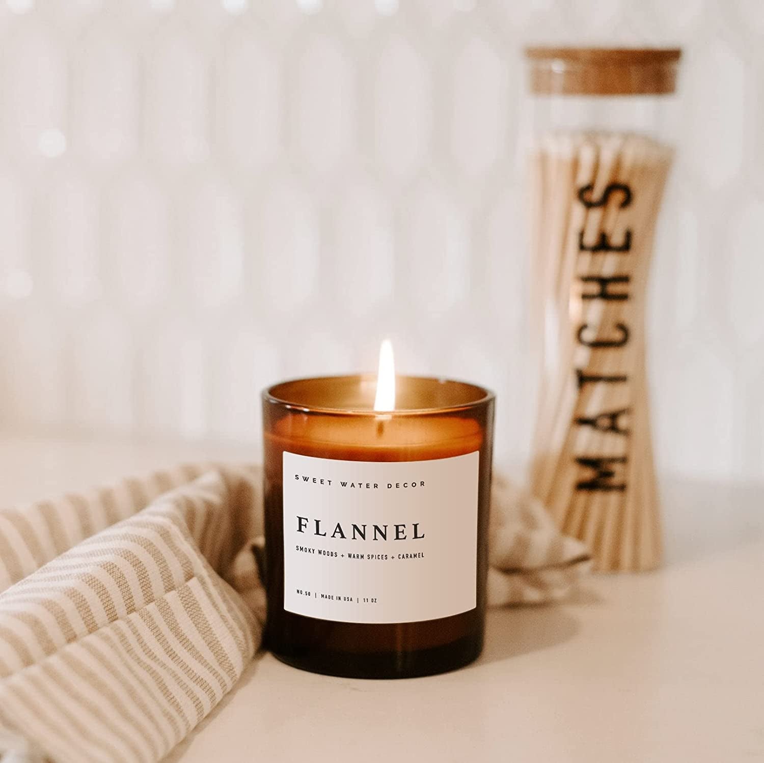 lit candle on counter