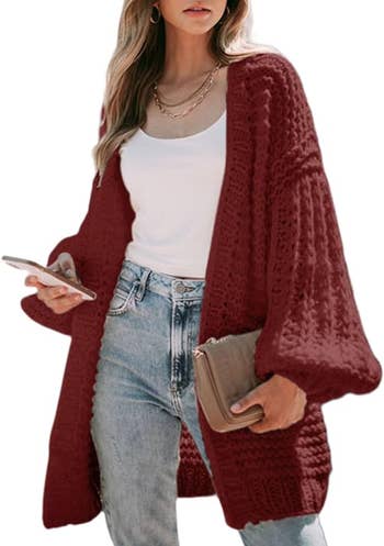 A model wearing the cardigan in burgundy 