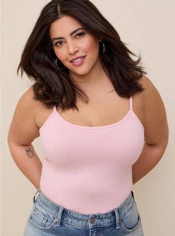 model in pink cami