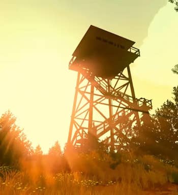 a screenshot from the game showing a watch tower as the sun sets 