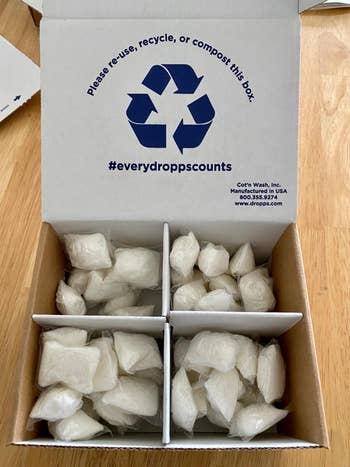 reviewer photo of the detergent pods in their compostable packaging