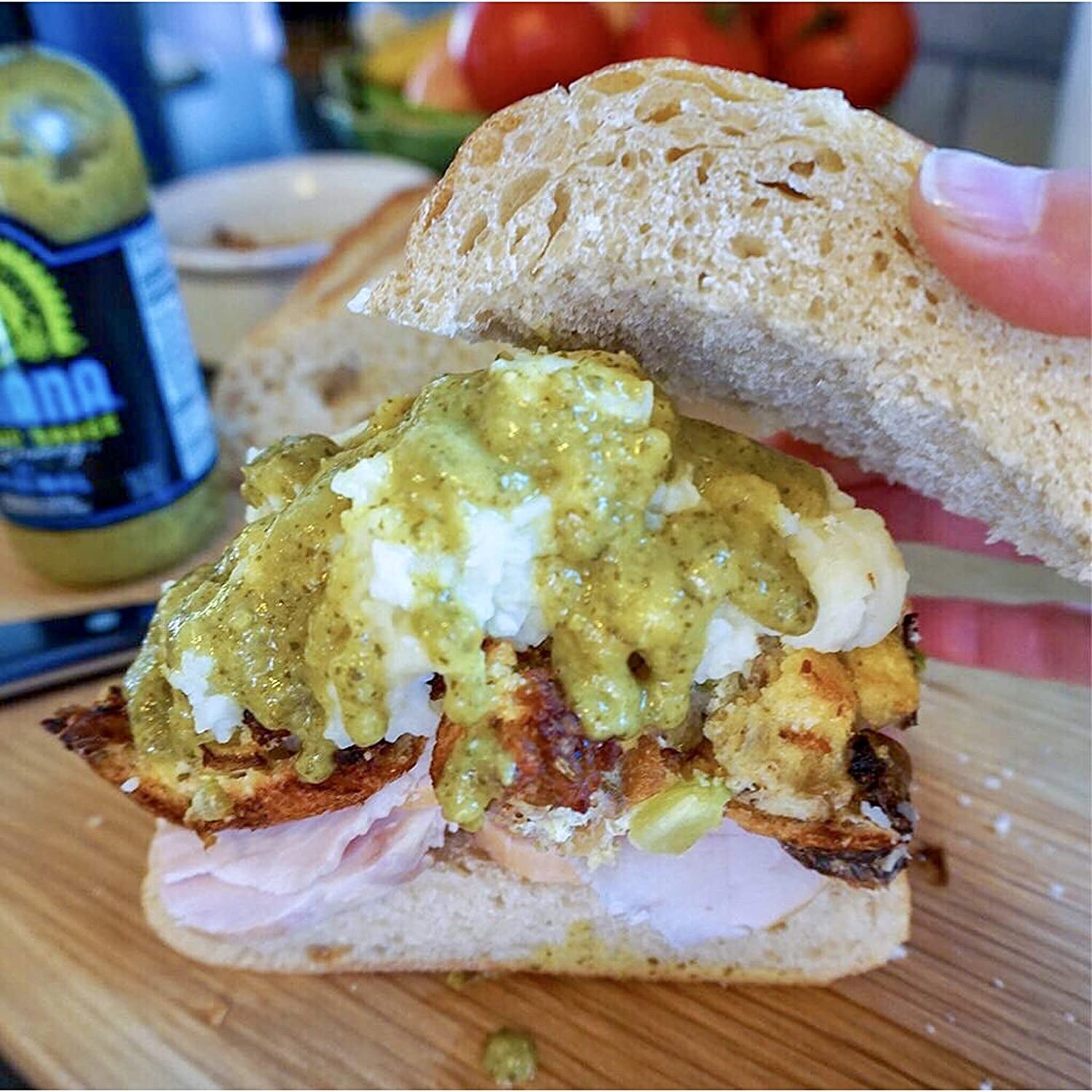 The green sauce on a sandwich