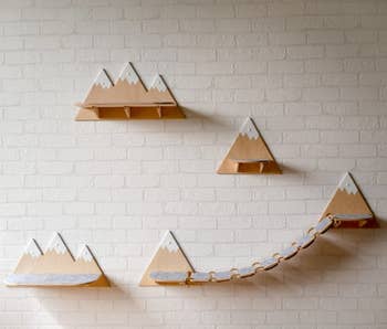 individual shelves that look like triangular mountain tops. one pair has a bridge.