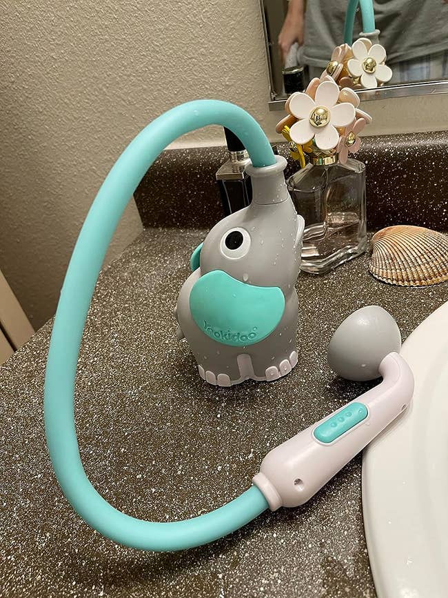 an elephant shower toy
