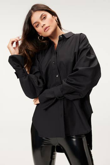 model wearing the oversized button down in black