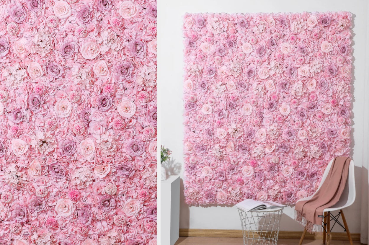 Close up of pink and purple 3D flowers, product decorated on a wall next to a chair with a blanket over it