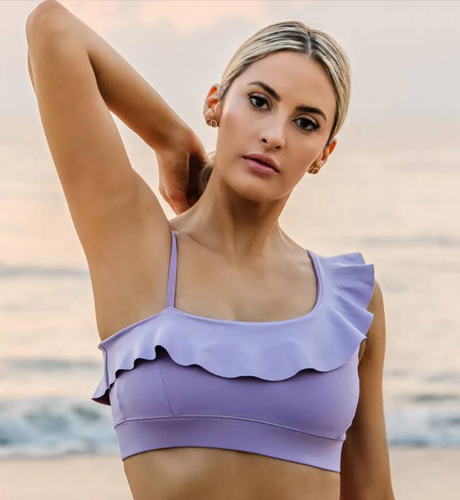 model wearing the purple bra