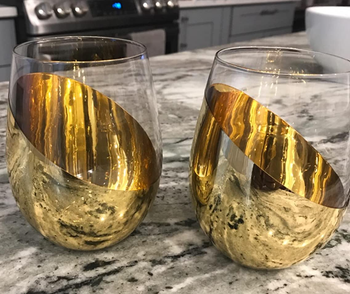Reviewer image of two gold glasses