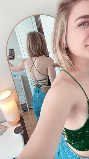 The back of the top with criss crossed straps 