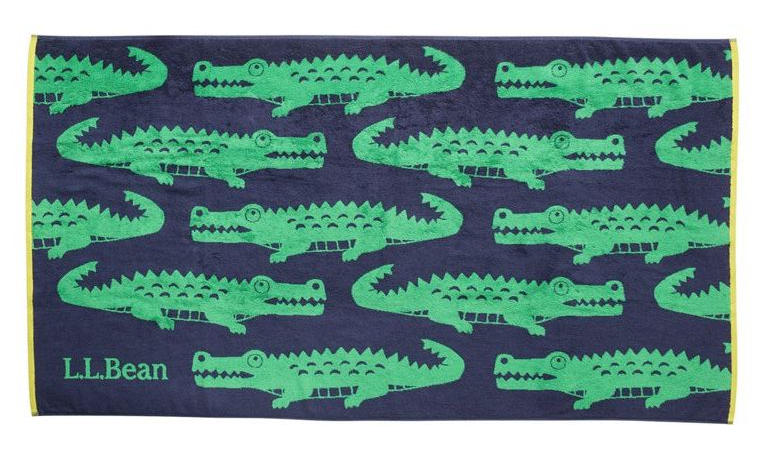 Image of the navy and green gator-print towel