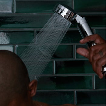 a model using the shower head