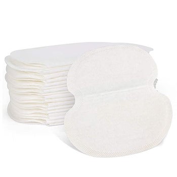 a stack of white pads
