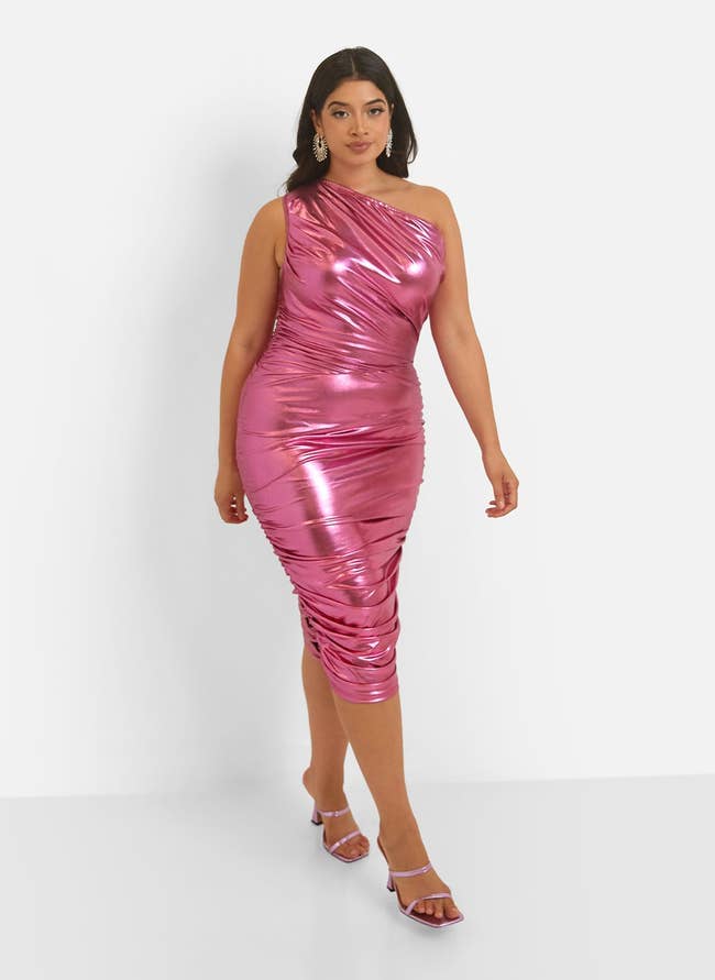 model wearing metallic pink dress