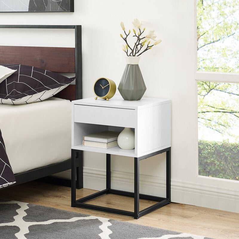 A modern black and white nightstand