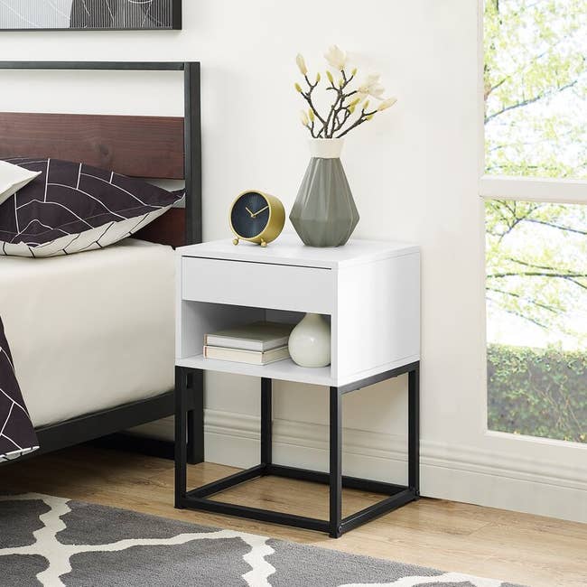 A modern black and white nightstand 