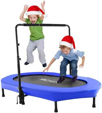 Two kids jumping on the blue trampoline