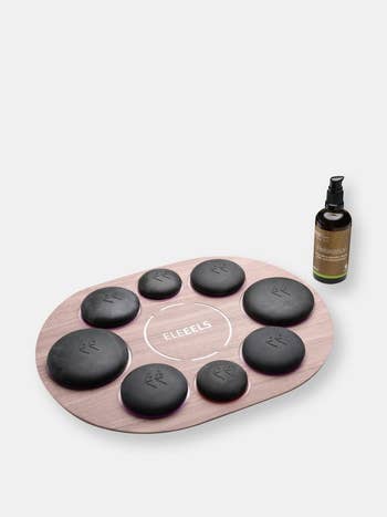 the heat stones, base, and massage oil