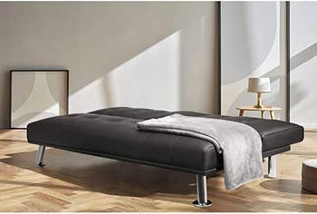 the faux leather futon fully reclined