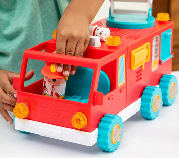 presents 3 year olds Child model playing with plastic red fire truck toy
