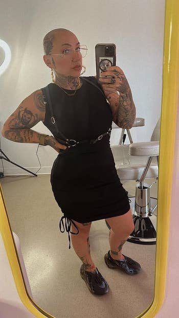 a reviewer wearing the dress taking a mirror selfie