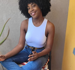 a reviewer wearing the covers under a white top