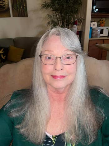 reviewer with long, consecutive  clean-looking hair