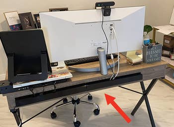 reviewer's desk organized without visible cables hanging down using the organizers