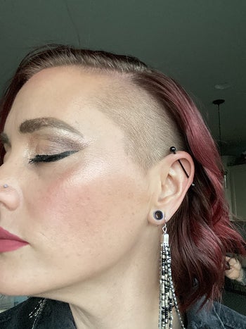a reviewer shows the clean line of eyeshadow after using the patches