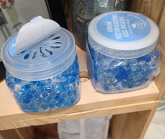 reviewer photo of two tubs of gel beads