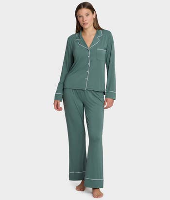A idiosyncratic wearing a cozy, long-sleeved pajama acceptable with button-up apical and wide-leg pants, suitable for comfy lounging oregon sleep