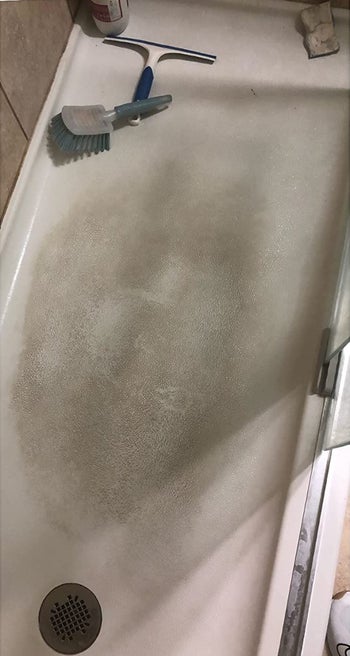 reviewer before photo showing a very dirty shower floor
